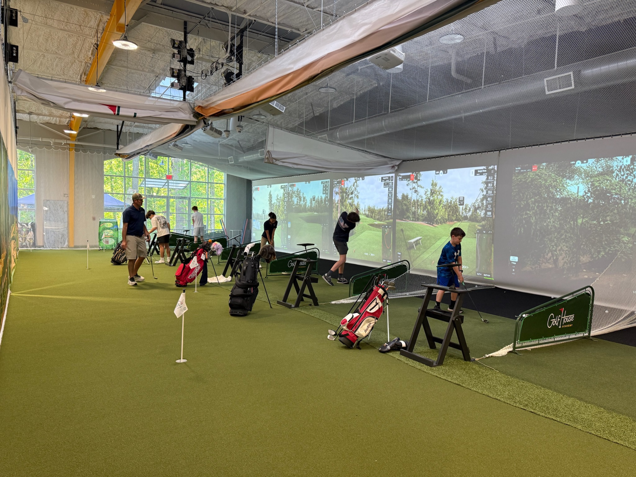 Adult golf clinic at Golf House Academy